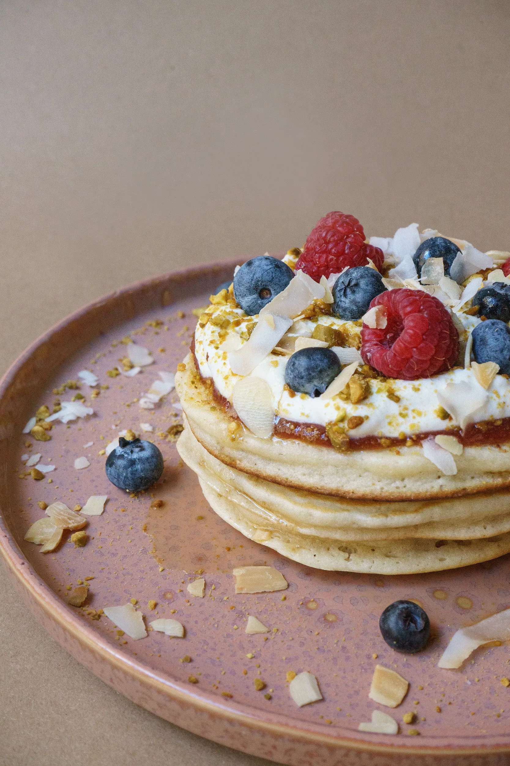 Berry pancakes with mascarpone cream and coconut
