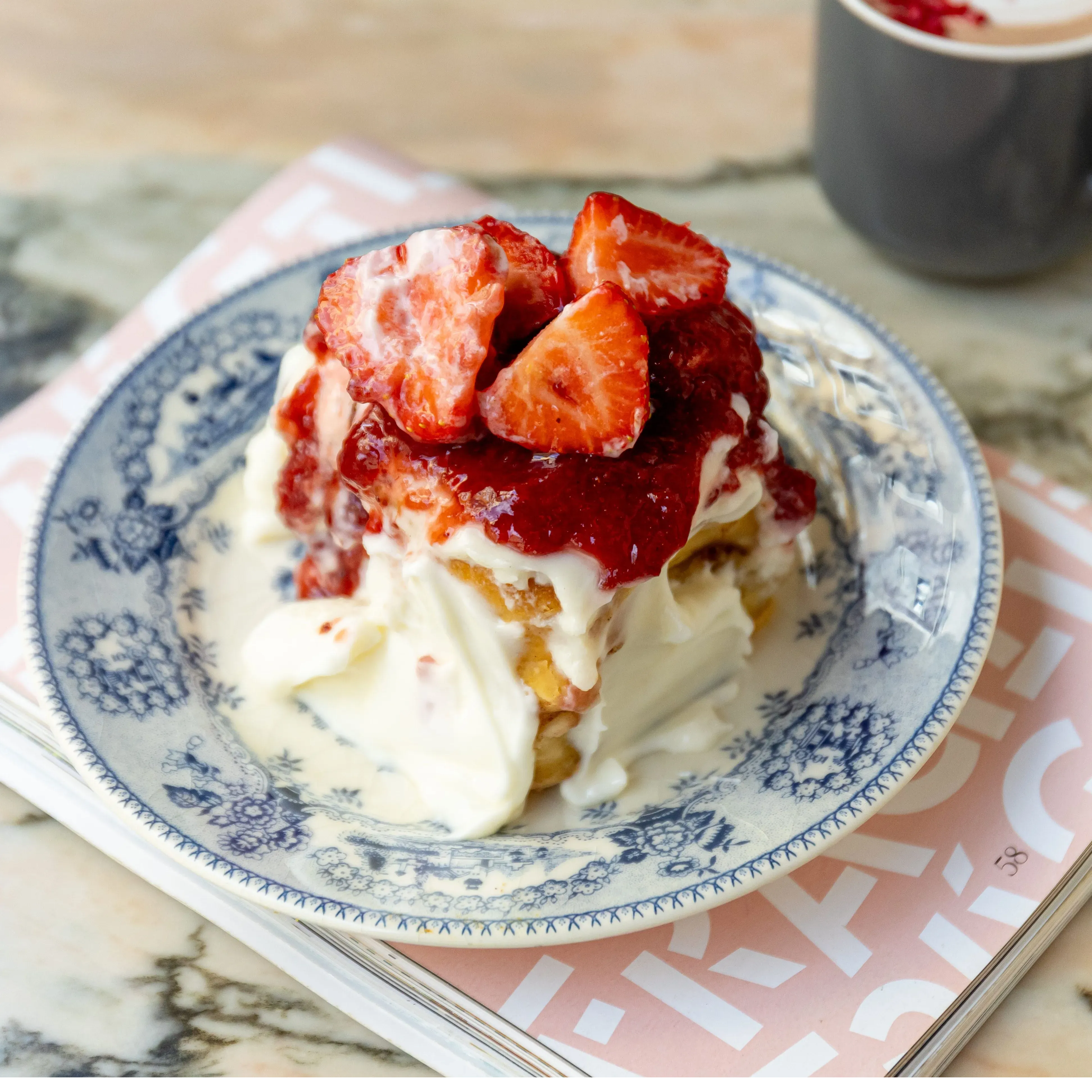Strawberry cinnamon roll with fresh berries